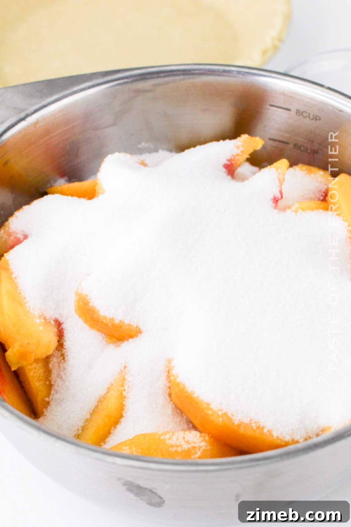 Mixing the peach pie filling ingredients