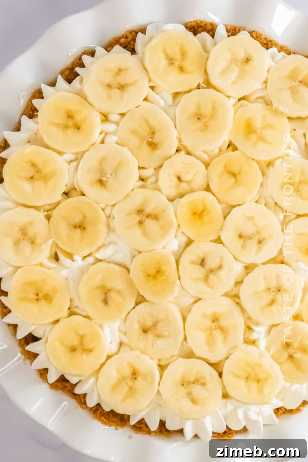 Homemade cream pie with bananas and whipped cream