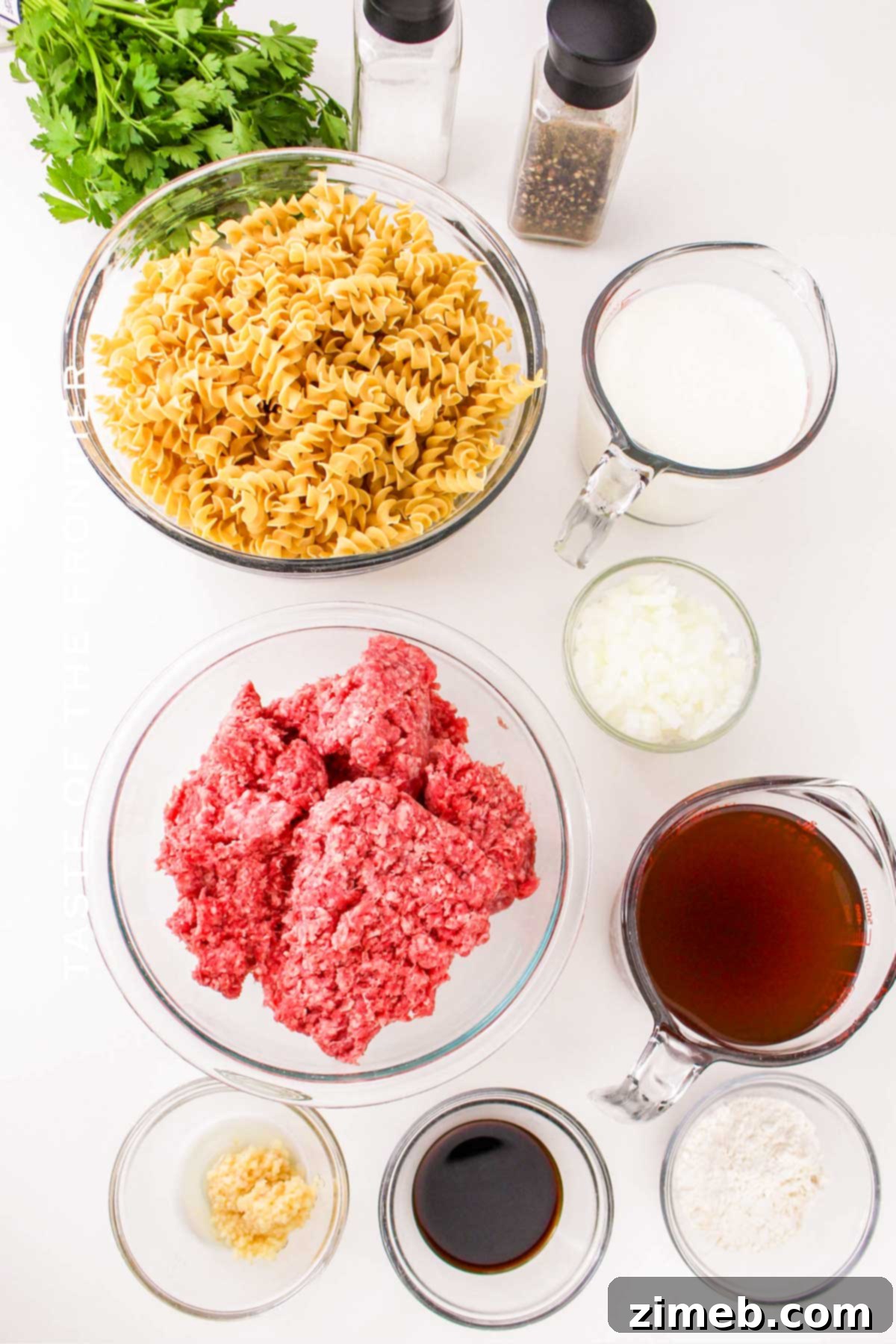 Hearty Beef Noodle Bowl 4 Ground Beef and Noodles ingredients laid out on a table