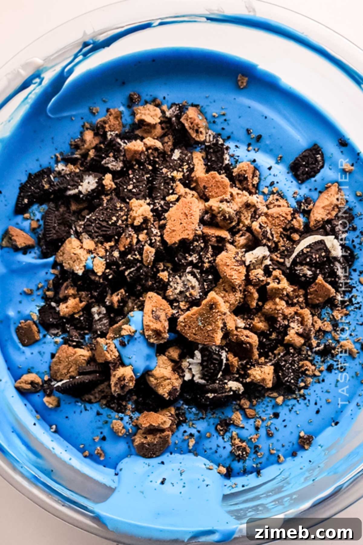 Monster Cookie Mania 7 Steps on how to make Cookie Monster Ice Cream, showing the mixture in a loaf pan.