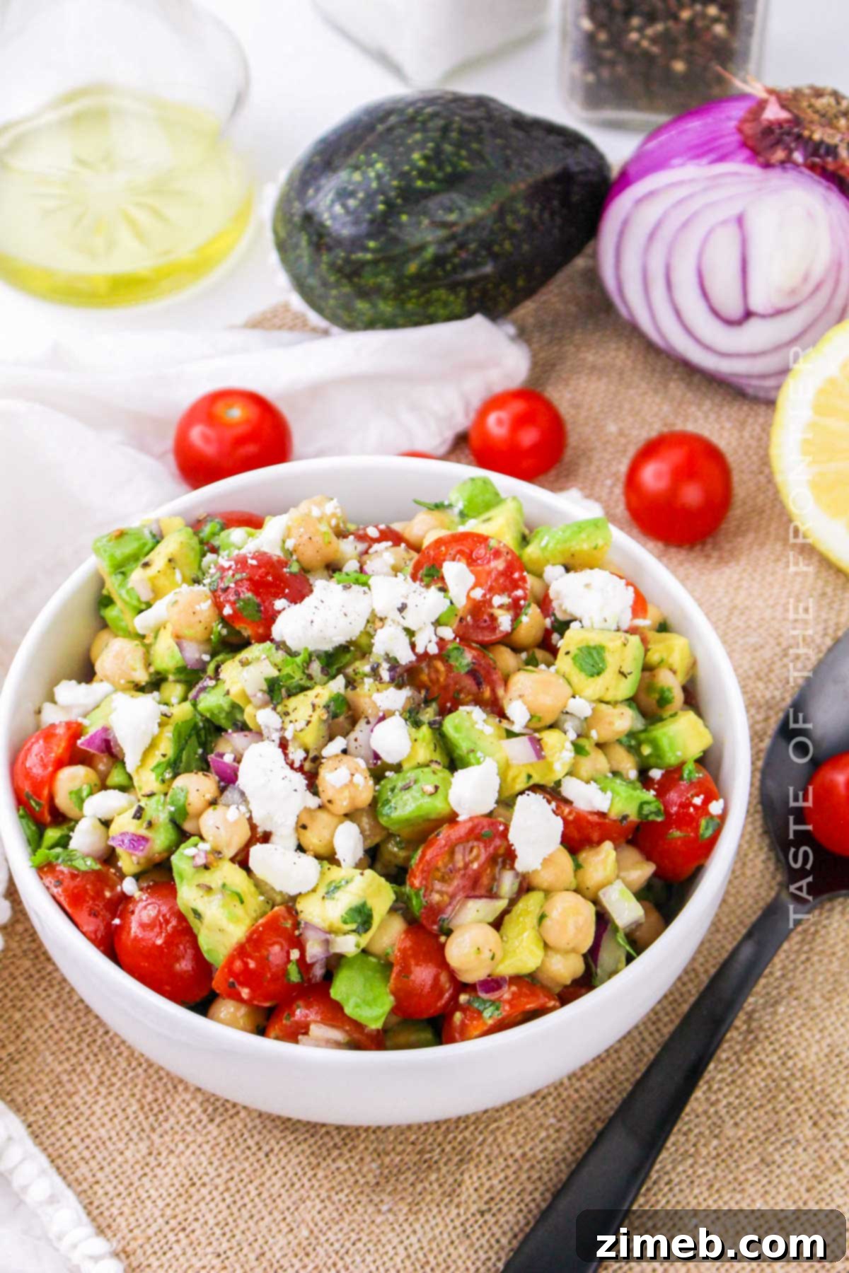 A bowl of Chickpea Avocado Salad, an easy side dish.