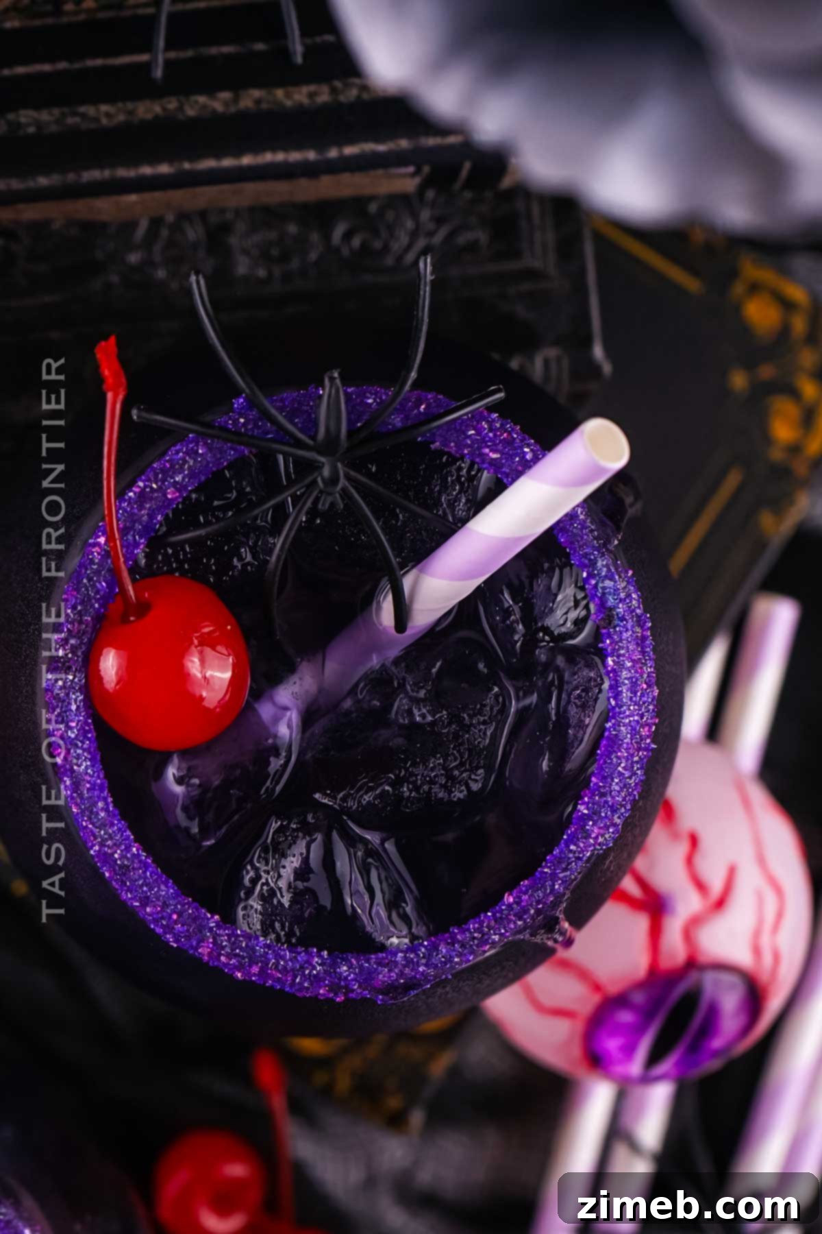 Spooky Halloween cocktail recipe in a tall glass