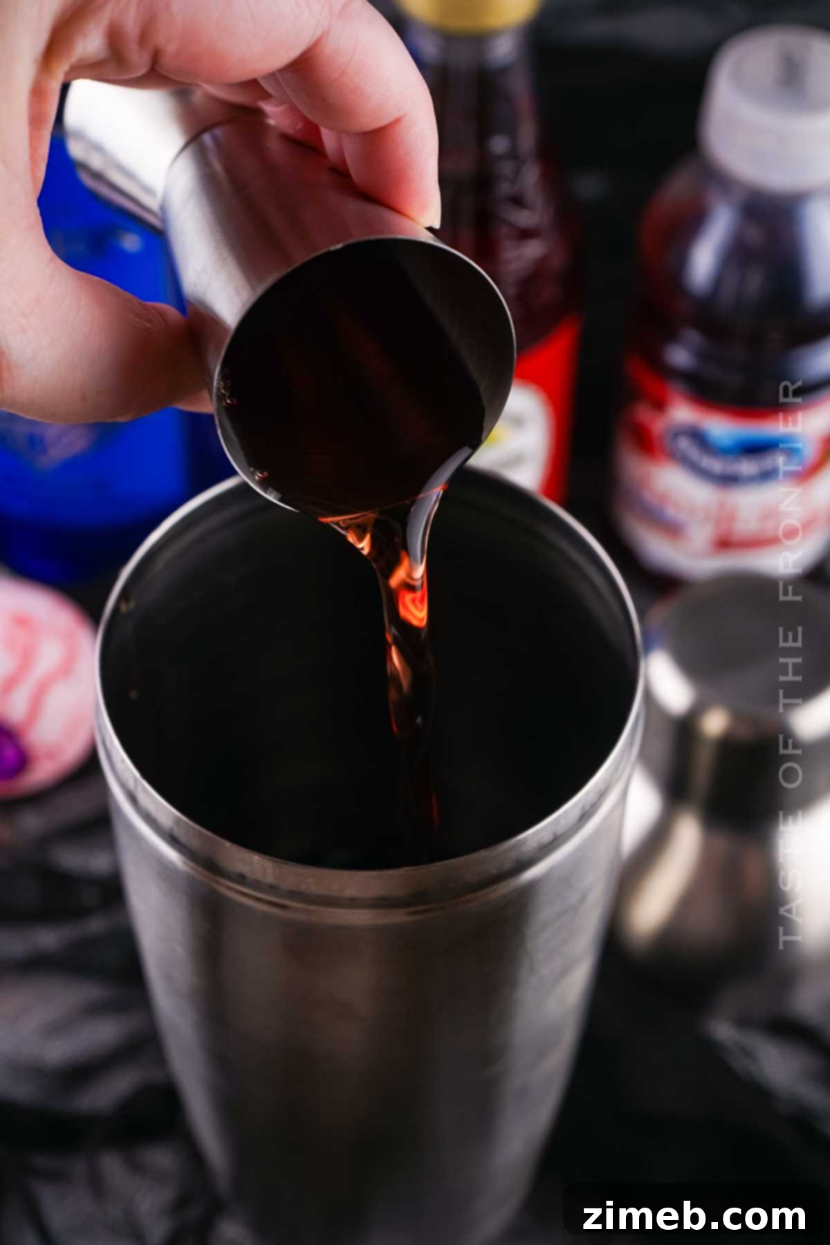 Instructions for how to make Purple People Eater Drink