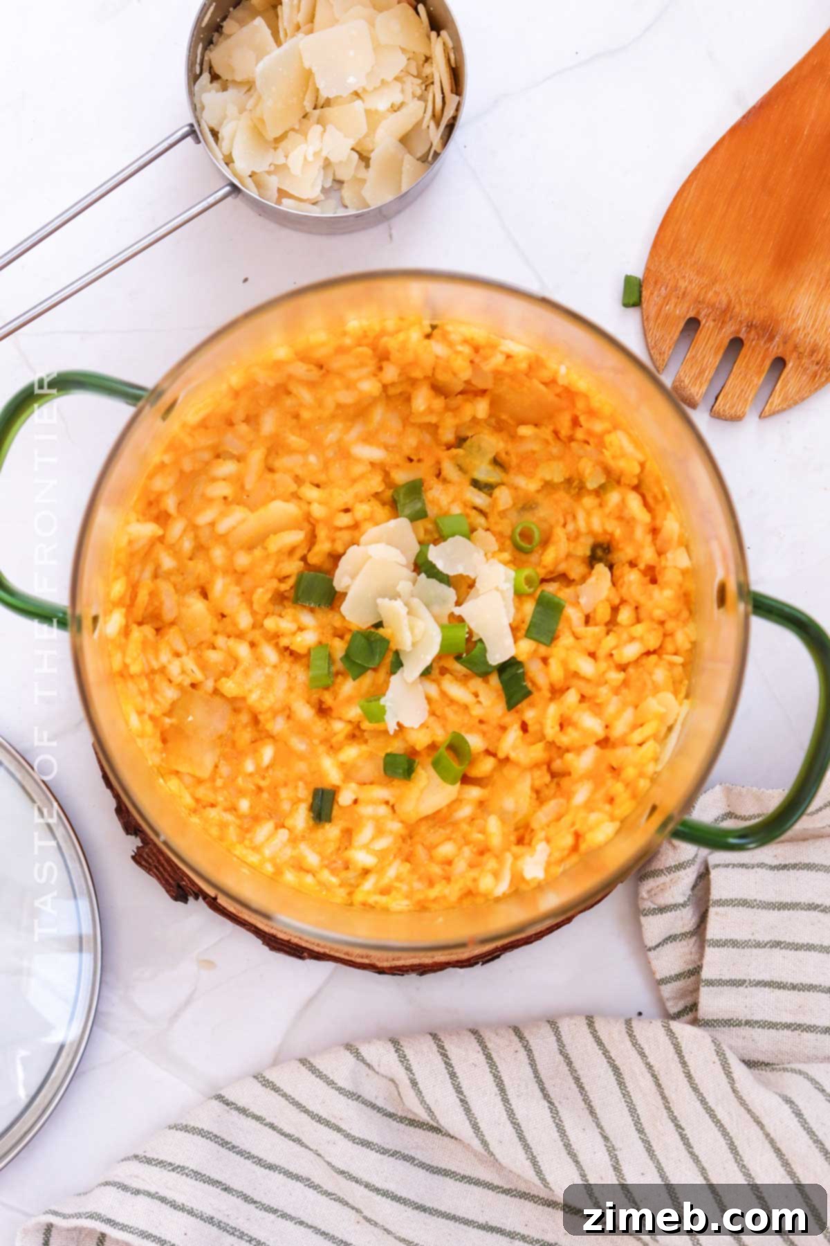 Velvet Pumpkin Risotto 7 A generous serving of creamy pumpkin risotto in a bowl, perfect for a comforting fall side dish.