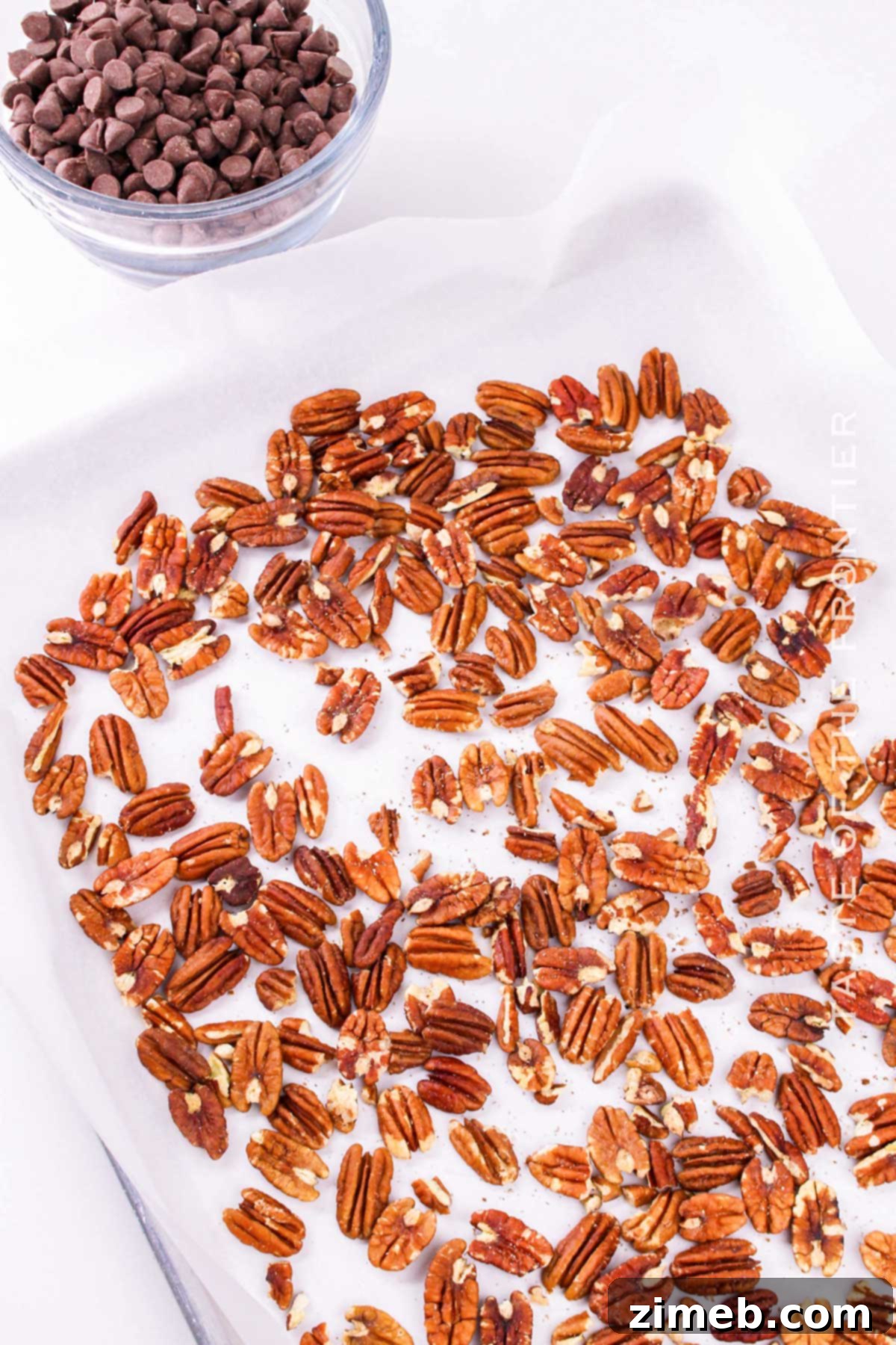 Caramel Pecan Indulgence 7 Toasting the pecans on a baking sheet for homemade candy