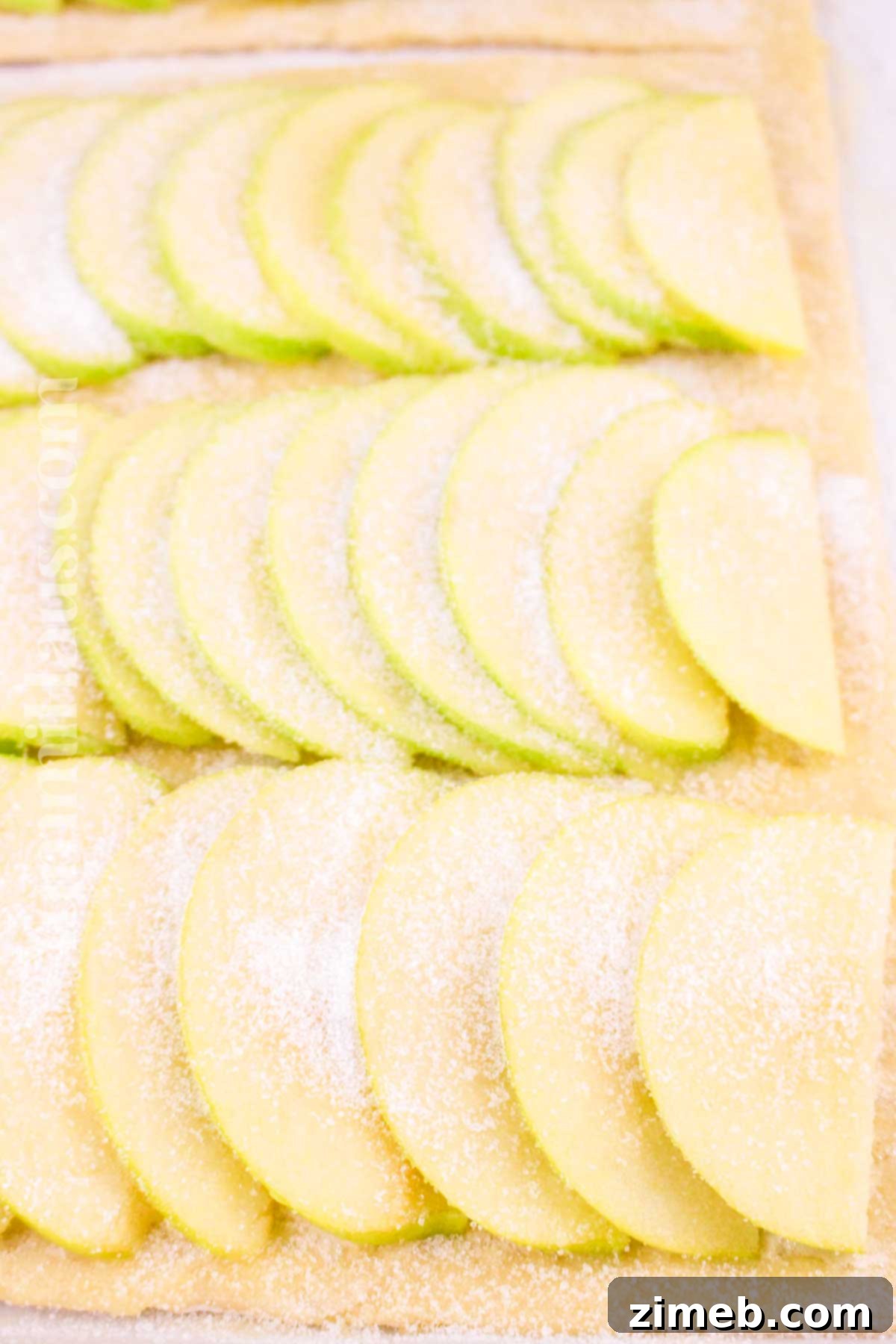 Step-by-step process of assembling an Easy Puff Pastry Apple Tart, from pastry to neatly arranged apples.