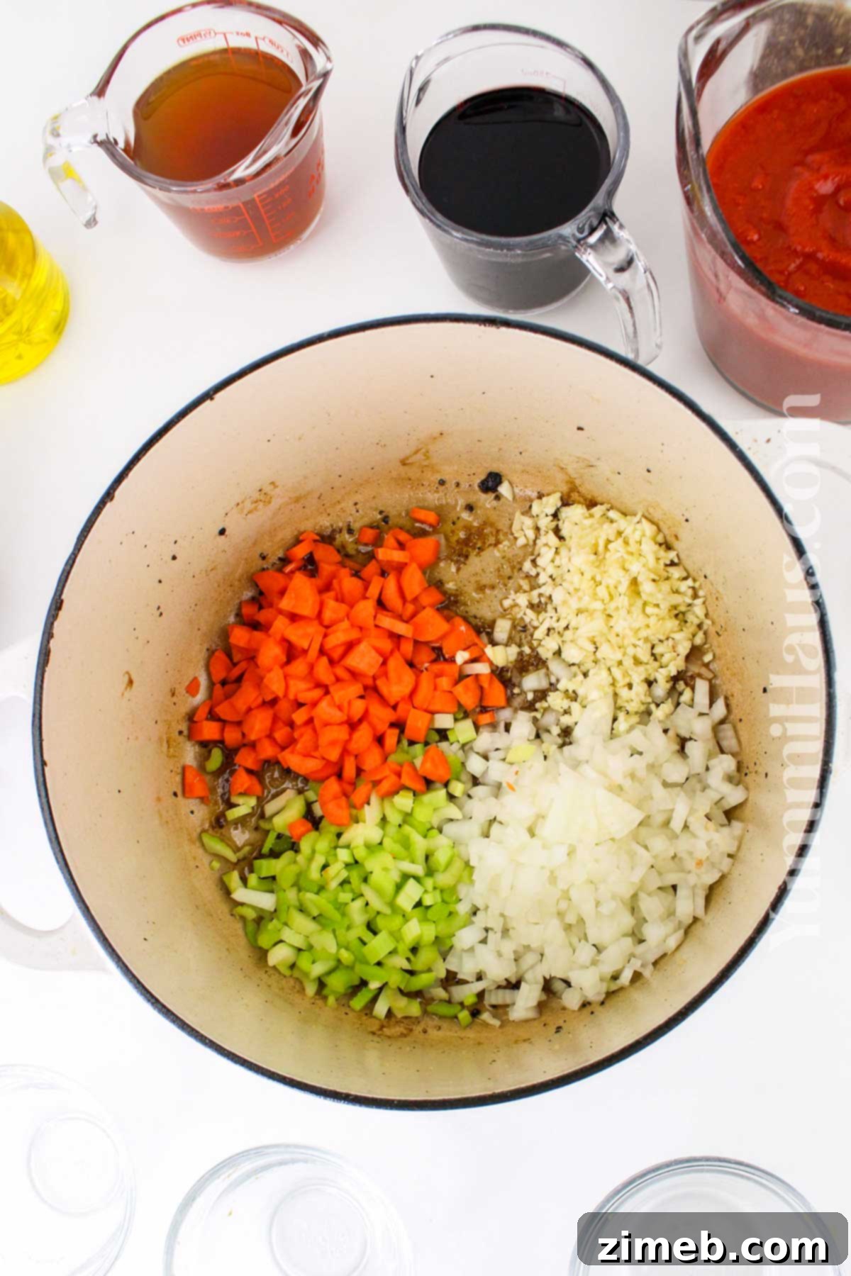 Slow-Braised Beef Short Rib Ragu 5 Sautéing the mirepoix (onions, carrots, celery) for the beef short rib ragu sauce