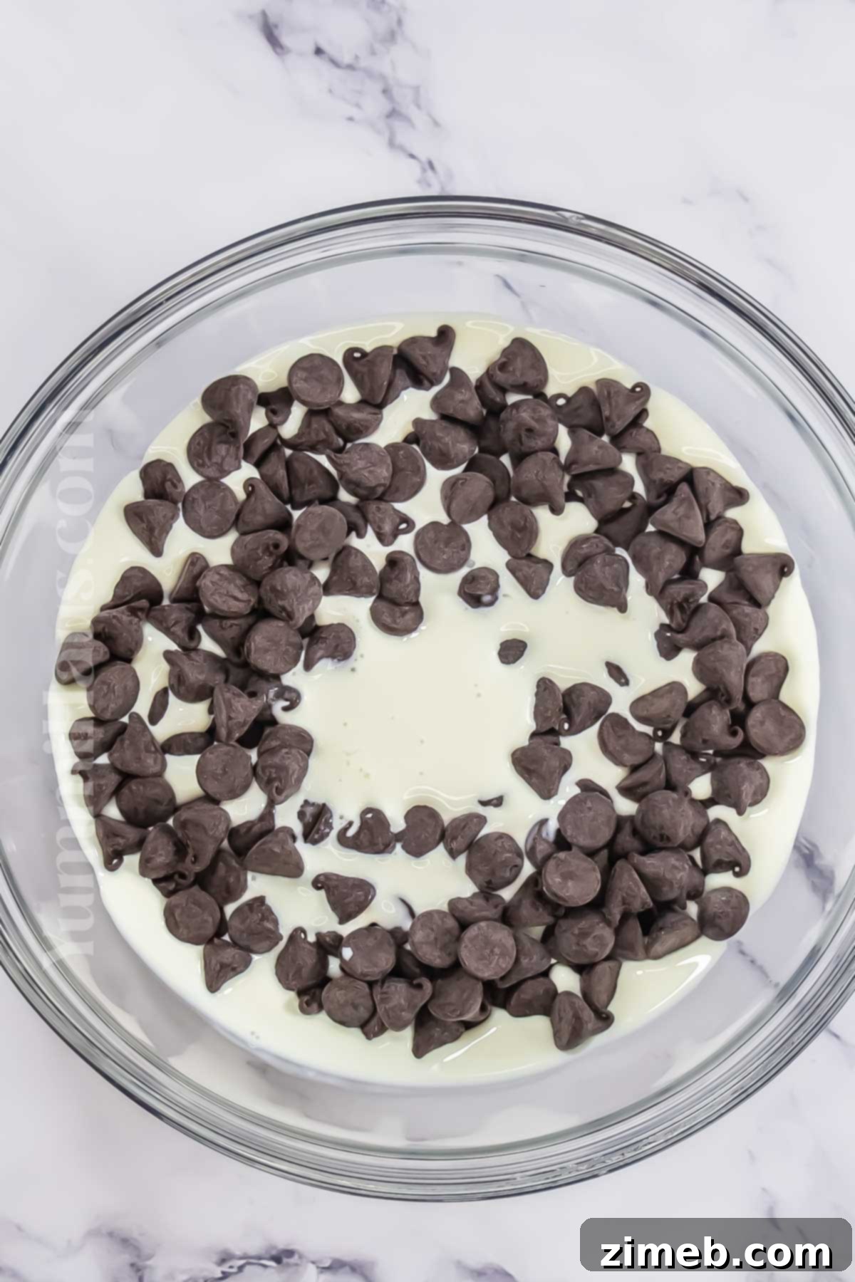 Making the ganache, a key step in chocolate mousse.
