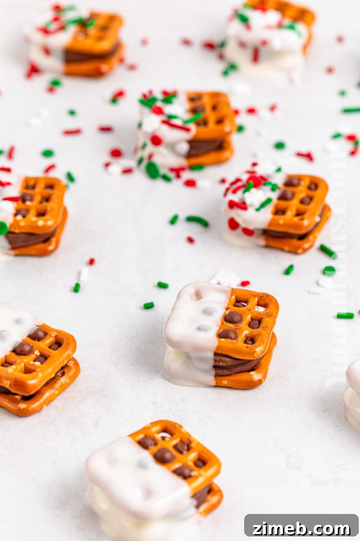 Salty Sweet Rolo Pretzel Bites 7 Decorate Rolo Pretzel Sandwiches with sprinkles and white chocolate
