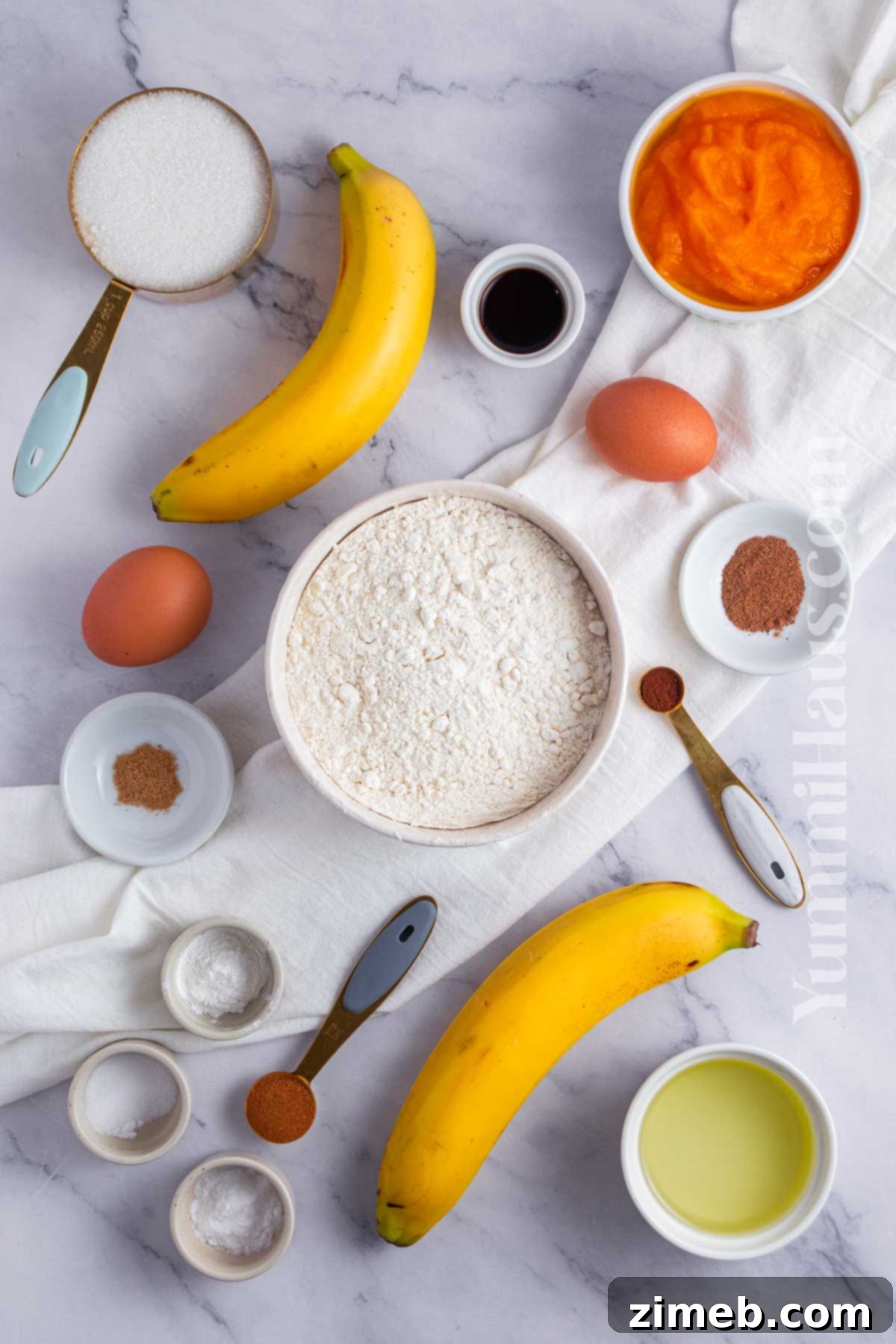 Ingredients laid out for banana and pumpkin muffins