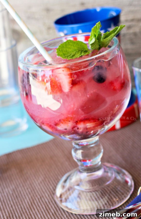Patriotic drink recipe for Memorial Day and 4th of July, featuring a layered daiquiri