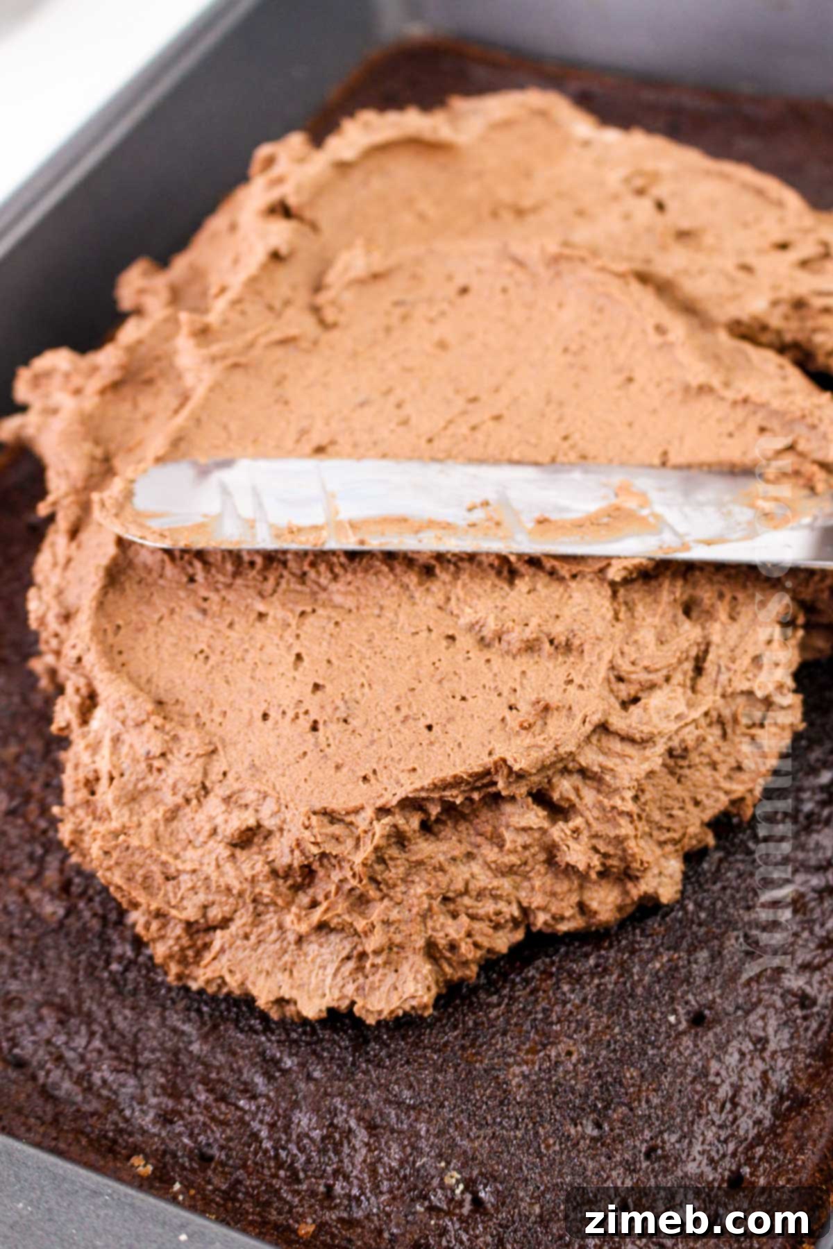 Decadent Double Chocolate Mousse Cake 8 decorating the cake