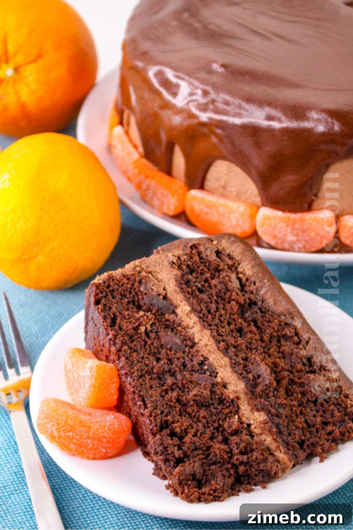 Close-up of a homemade chocolate cake being frosted.