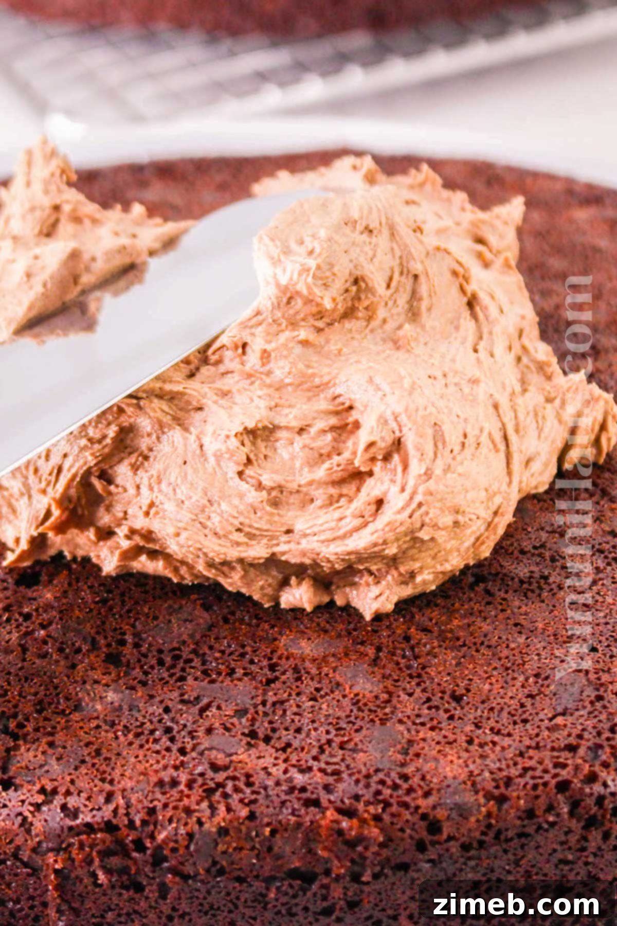 Steps involved in making a homemade chocolate orange cake from scratch.