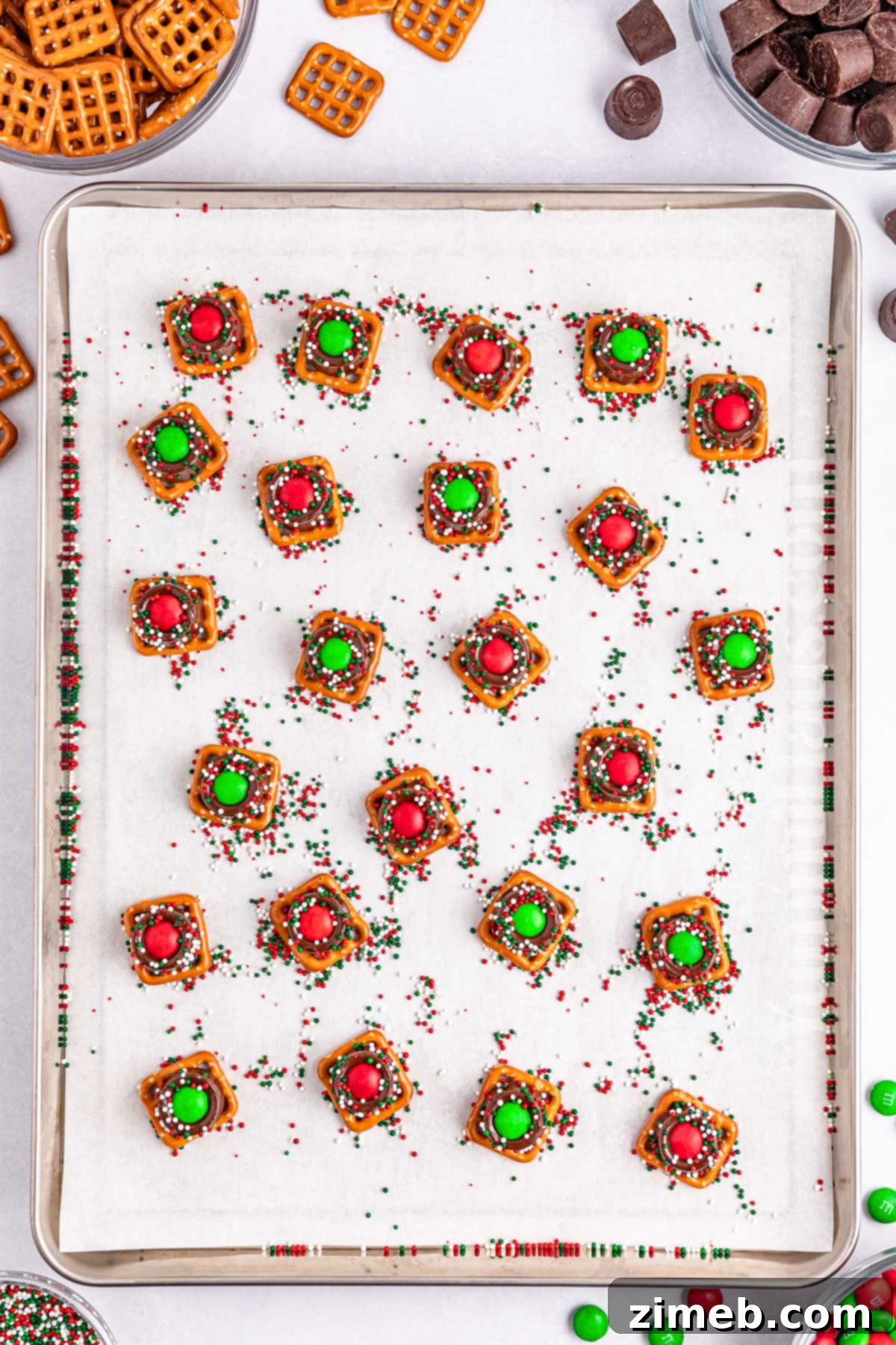 Decorating Christmas Rolo Pretzels with Sprinkles and M&M's
