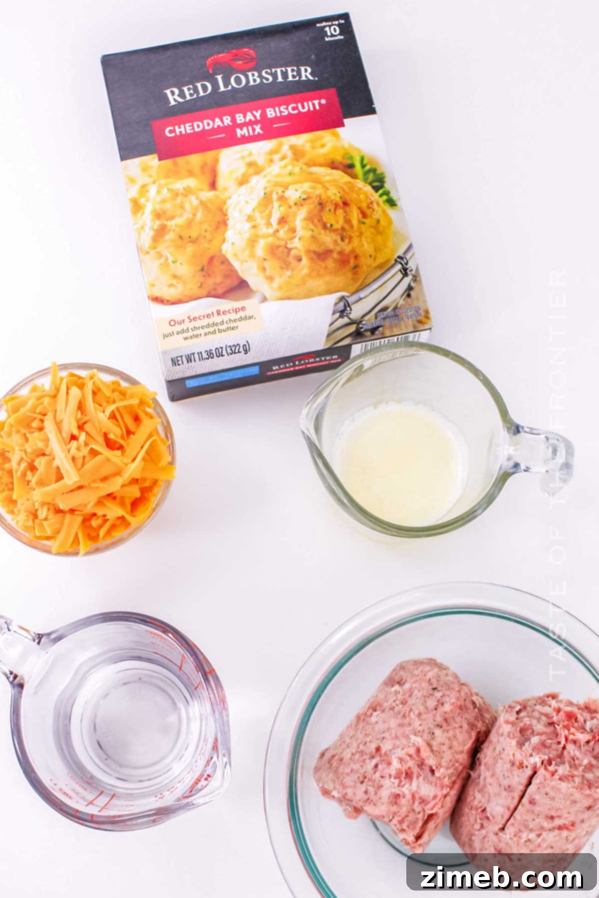 Cheesy Cheddar Bay Sausage Balls 4 Cheddar Bay Sausage Ball ingredients laid out