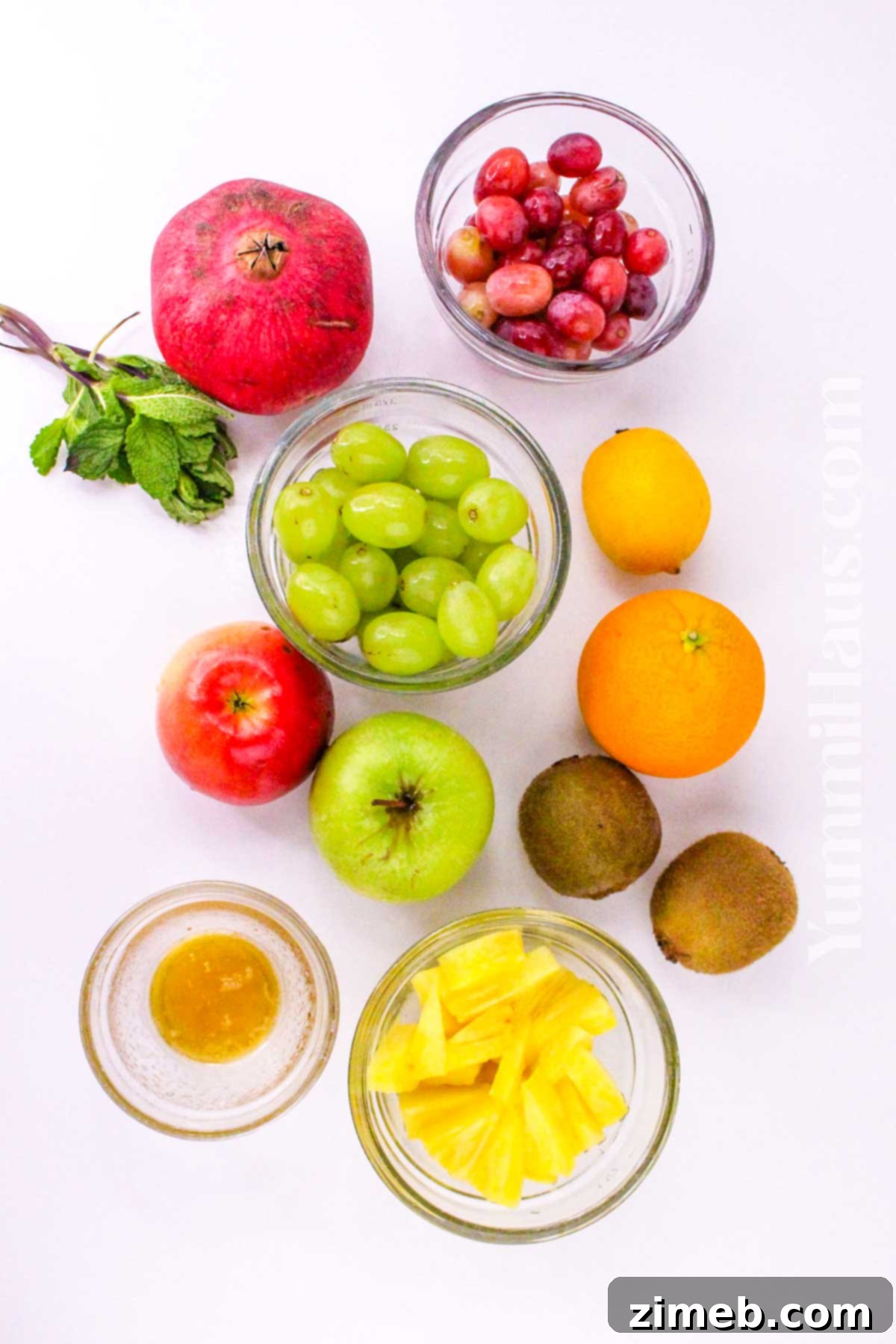 Fresh ingredients for a festive Christmas Fruit Salad.