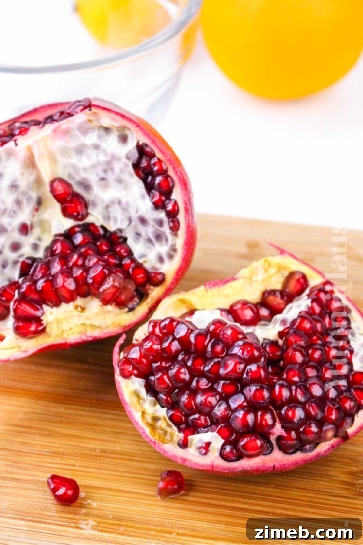Cutting a pomegranate for a festive fruit salad.