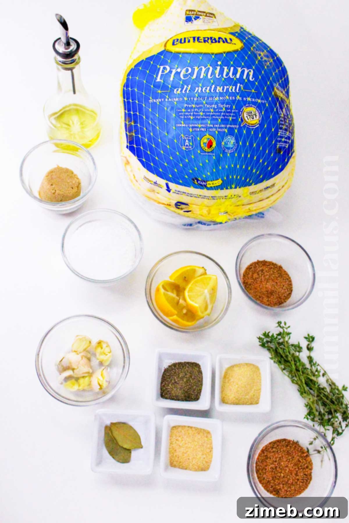 Cajun Turkey Brine ingredients showing fresh lemon, herbs, and spices