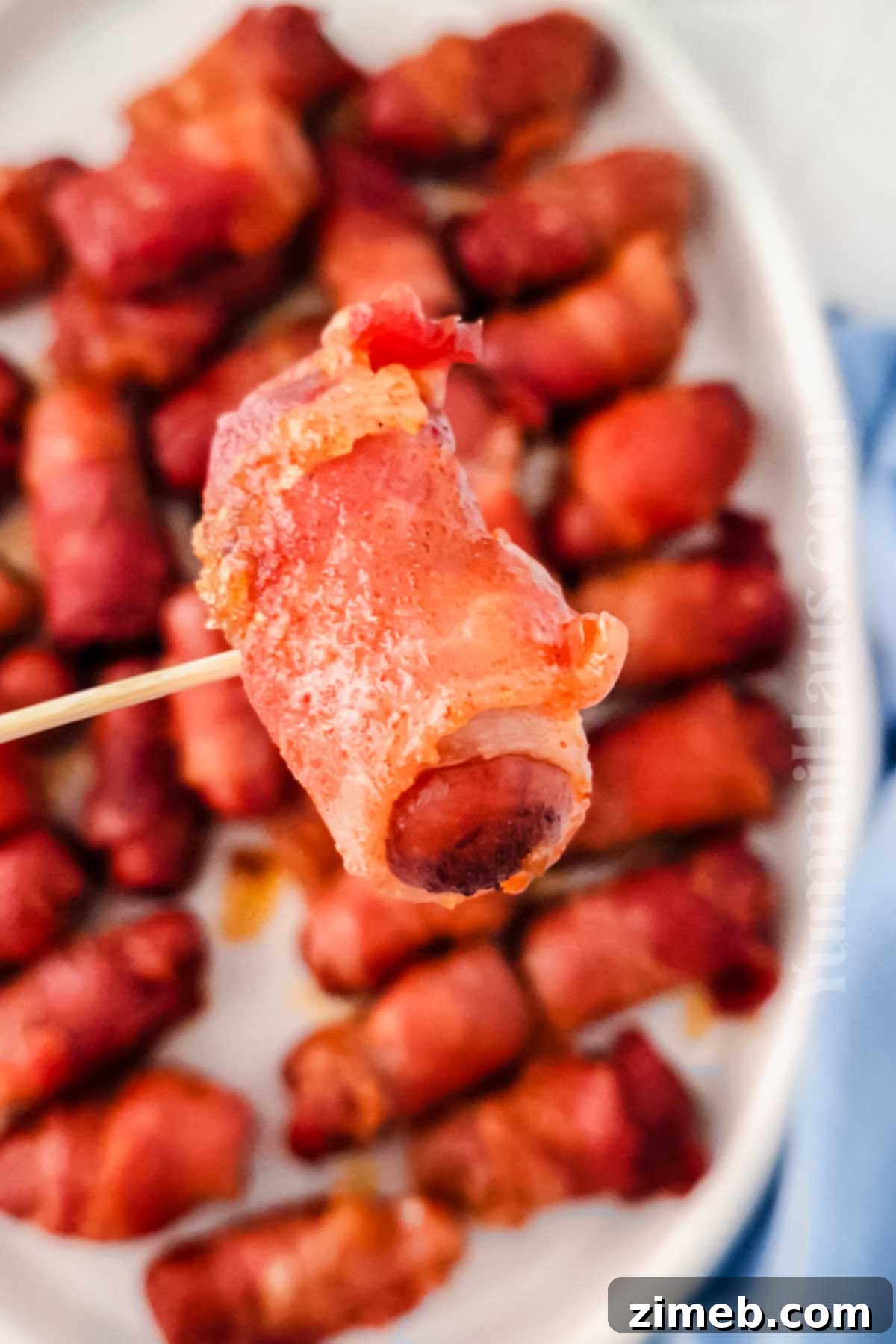 Smoky Bacon Delights 3 Sweet, smoky, and irresistible, these bacon-wrapped smokies make the perfect party appetizer! With a hint of brown sugar and crispy bacon, they're an easy crowd-pleaser for any occasion.