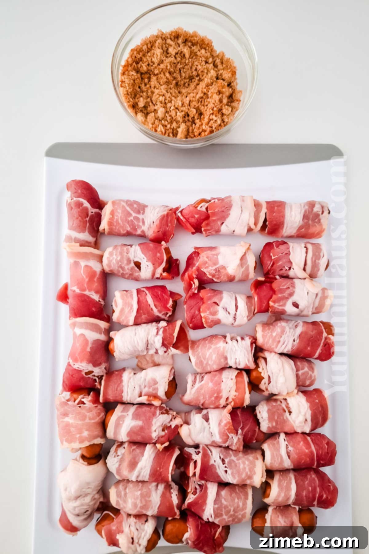 Smoky Bacon Delights 6 Sweet, smoky, and irresistible, these bacon-wrapped smokies make the perfect party appetizer! With a hint of brown sugar and crispy bacon, they're an easy crowd-pleaser for any occasion.