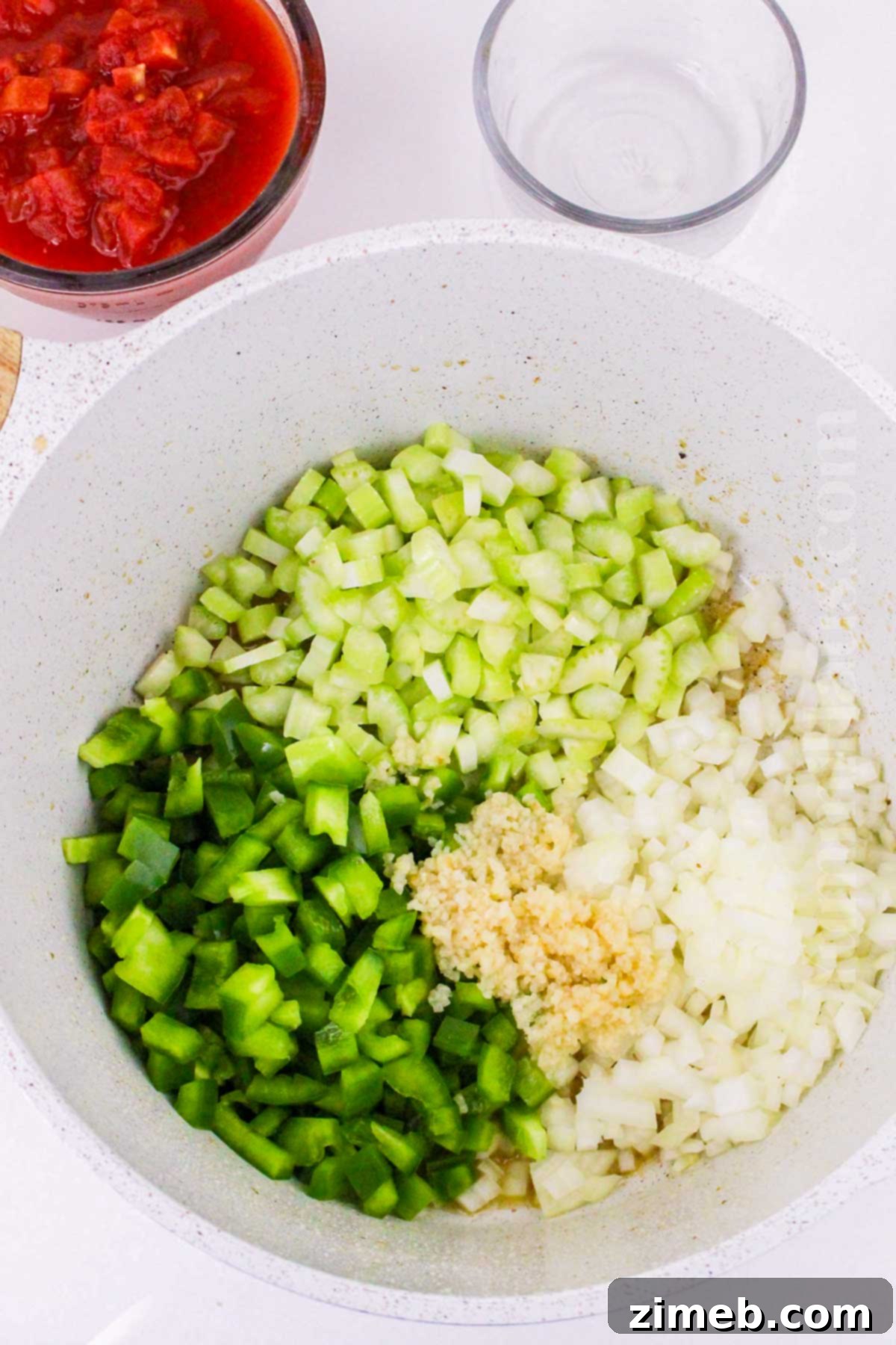 Hearty Chicken and Sausage Gumbo 6 Sautéing the holy trinity of vegetables for gumbo.