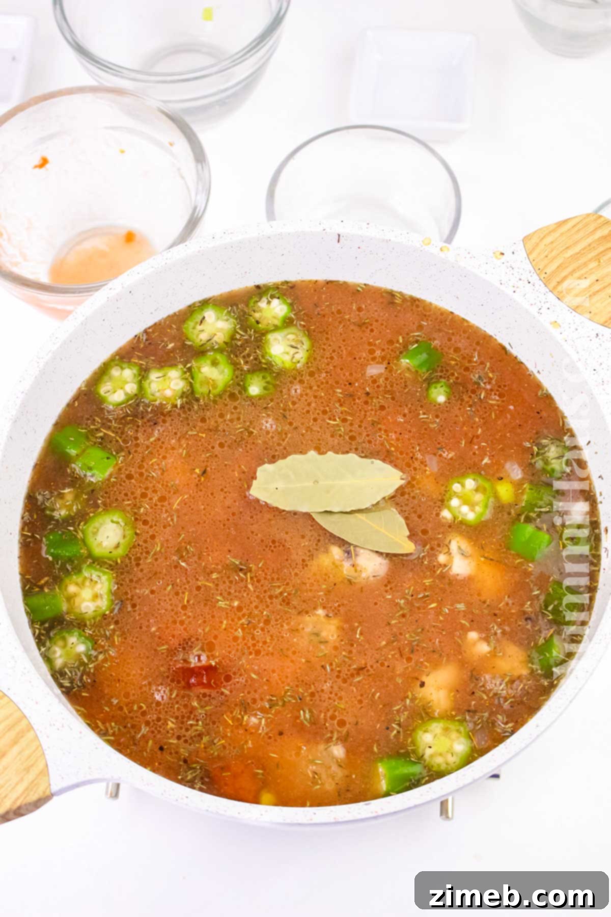 Hearty Chicken and Sausage Gumbo 8 Hearty gumbo soup served in a bowl, ready to enjoy.