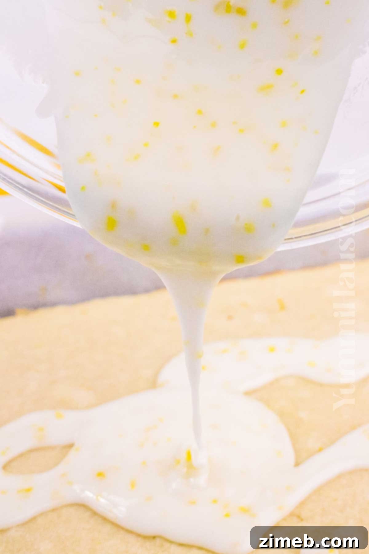 Sunshine Lemon Cookie Bars 6 adding the lemon galze