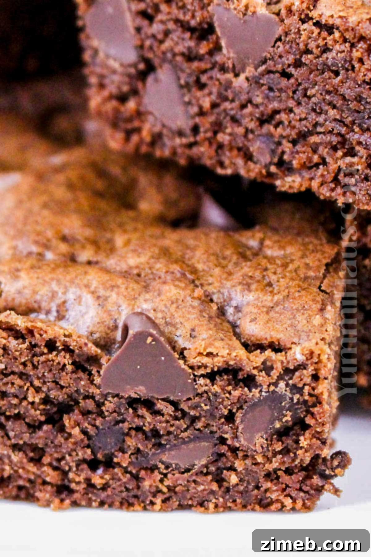A selection of delicious chocolate bars, showcasing the fudgy texture of the cookie bars