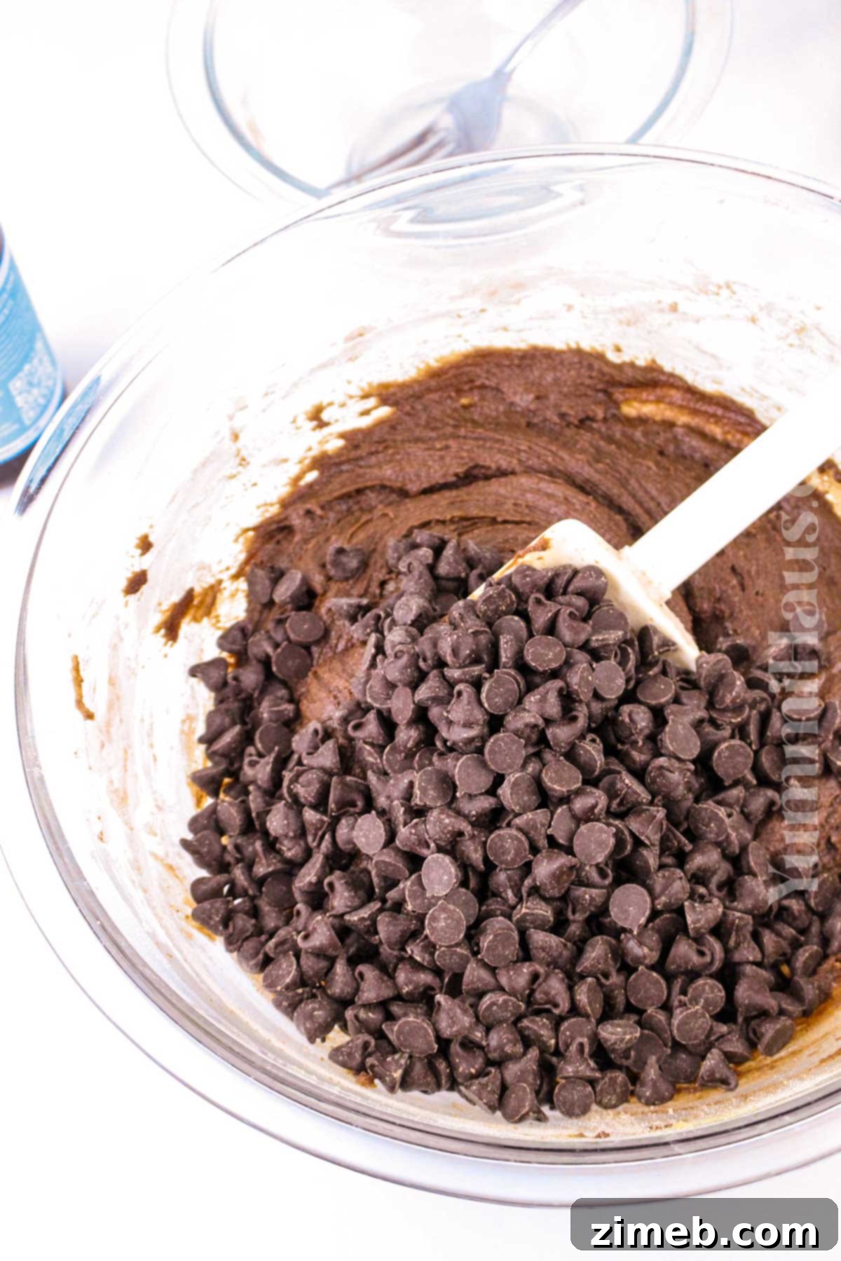 Steps for how to make Chocolate Chocolate Chip Cookie Bars, showing the baked result