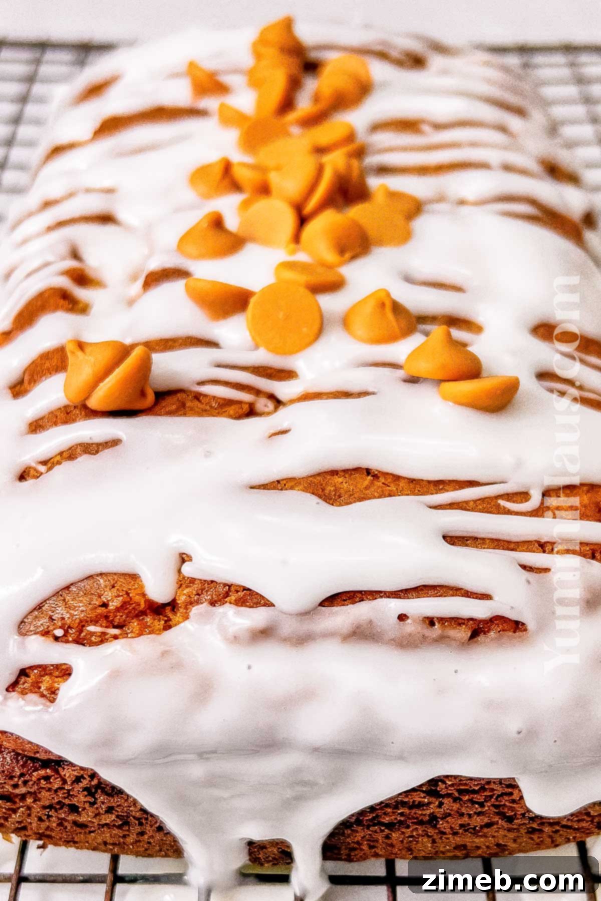 Glazed butterscotch quick bread slice ready to serve.