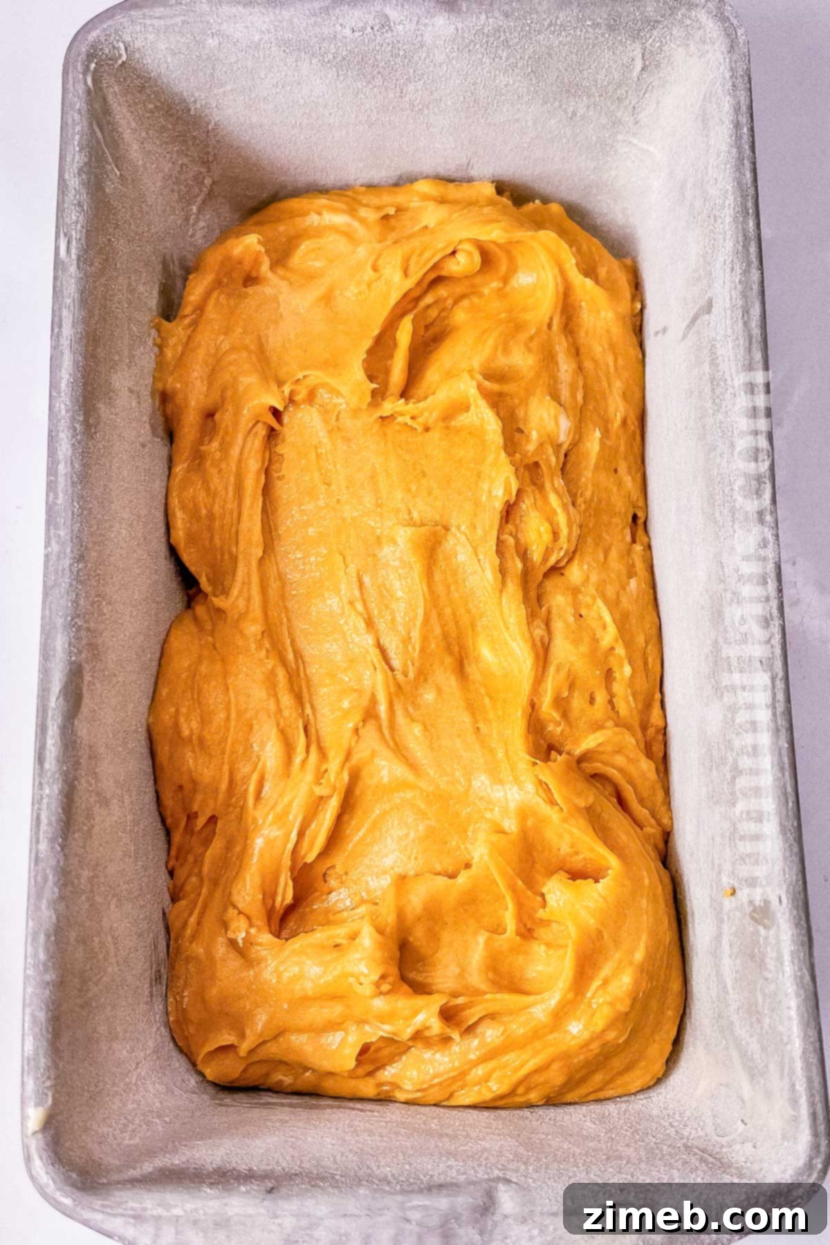 Butterscotch bread batter ready to bake in the loaf pan.