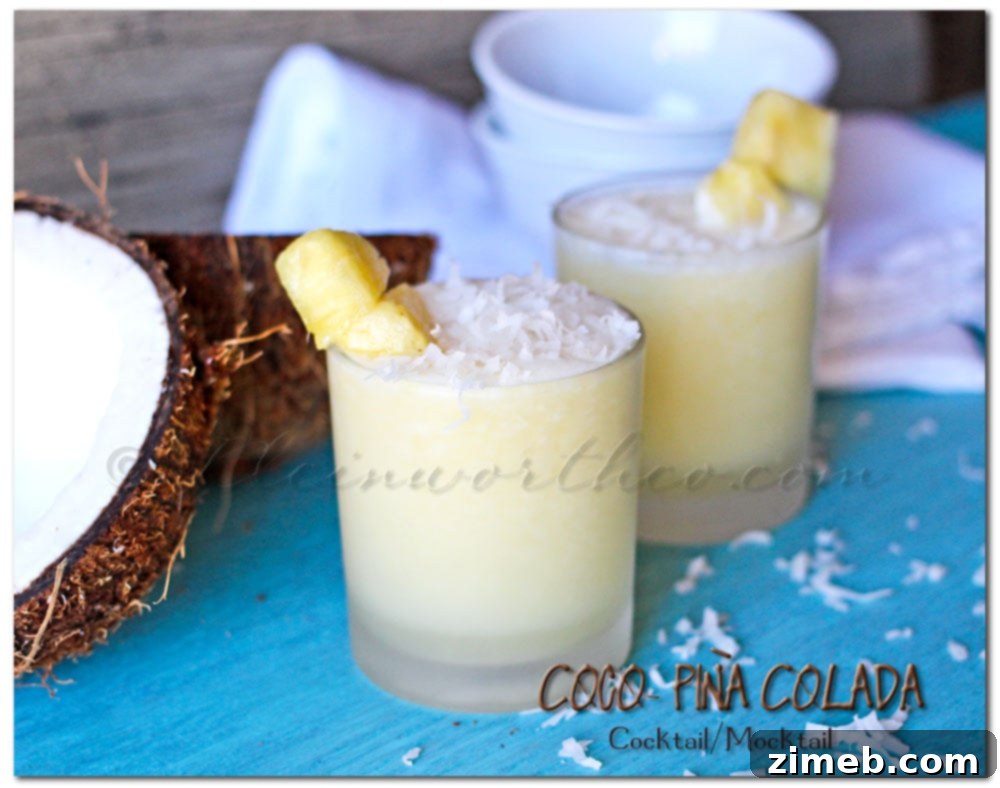 Delicious Coco Piña Colada Mocktail or Cocktail, garnished with pineapple and coconut