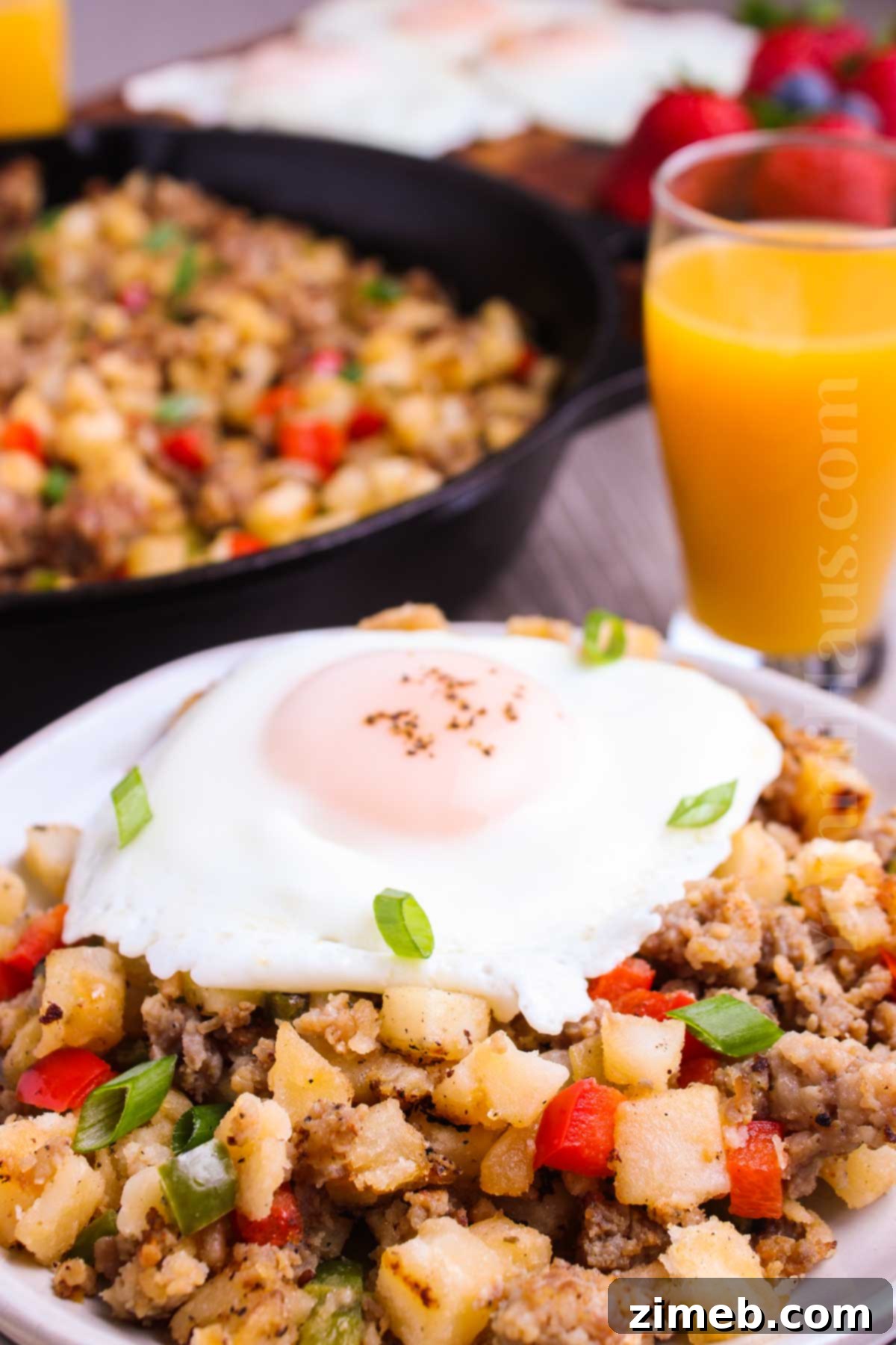 Rise & Shine Hash 8 Hearty breakfast hash on a plate with eggs
