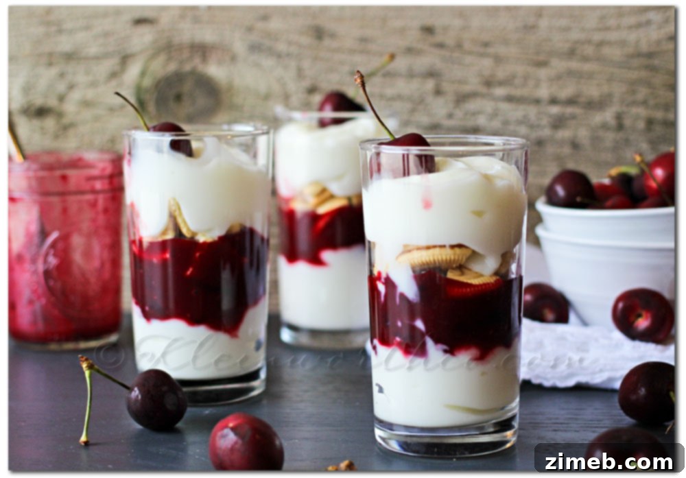 Deconstructed Cherry Pie 2 Delicious Cherry Pie Parfait layers in a glass, perfect for a summer treat.