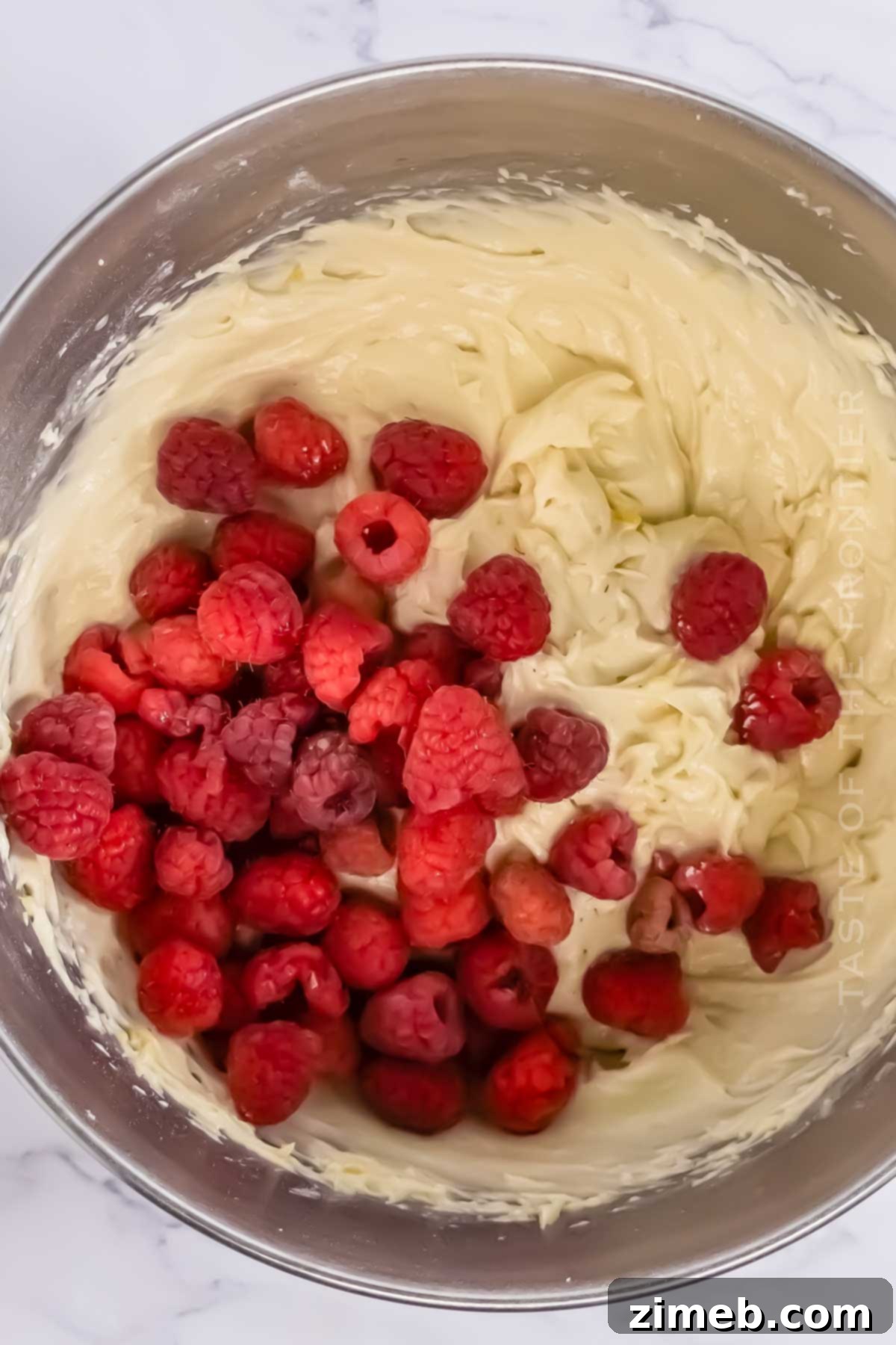Zesty Lemon & Raspberry Delights 5 how to make Lemon and Raspberry Cupcakes
