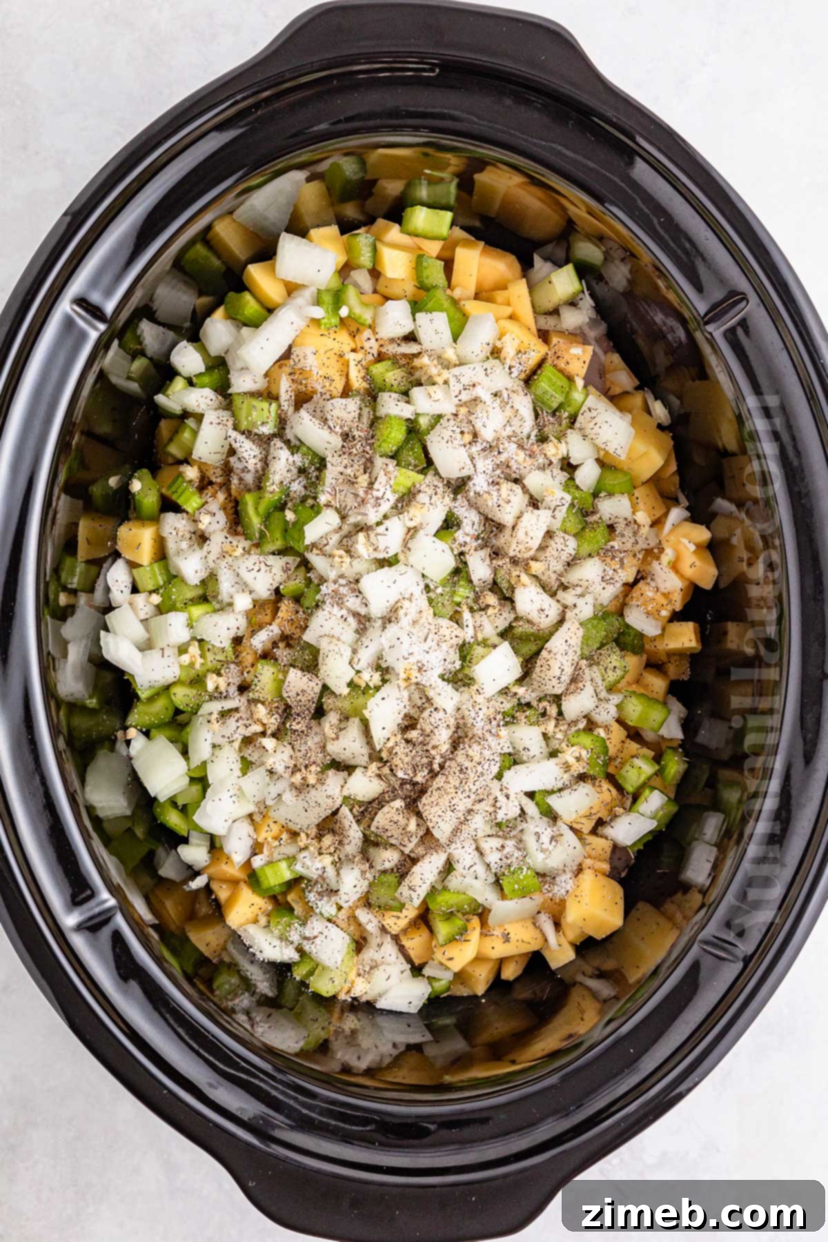Slow Cooked Comfort Chicken Pie 6 Combine the veggies in the slow cooker for chicken pot pie