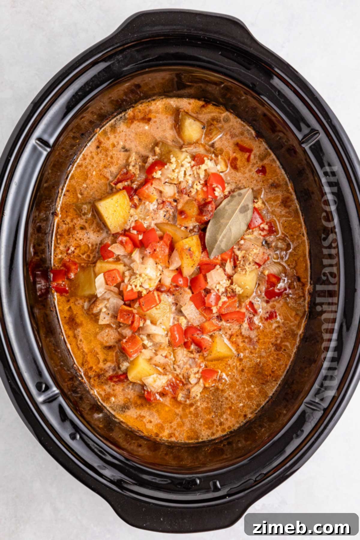 Flavorful Slow Cooker Chicken Curry 6 making curry in the slow cooker