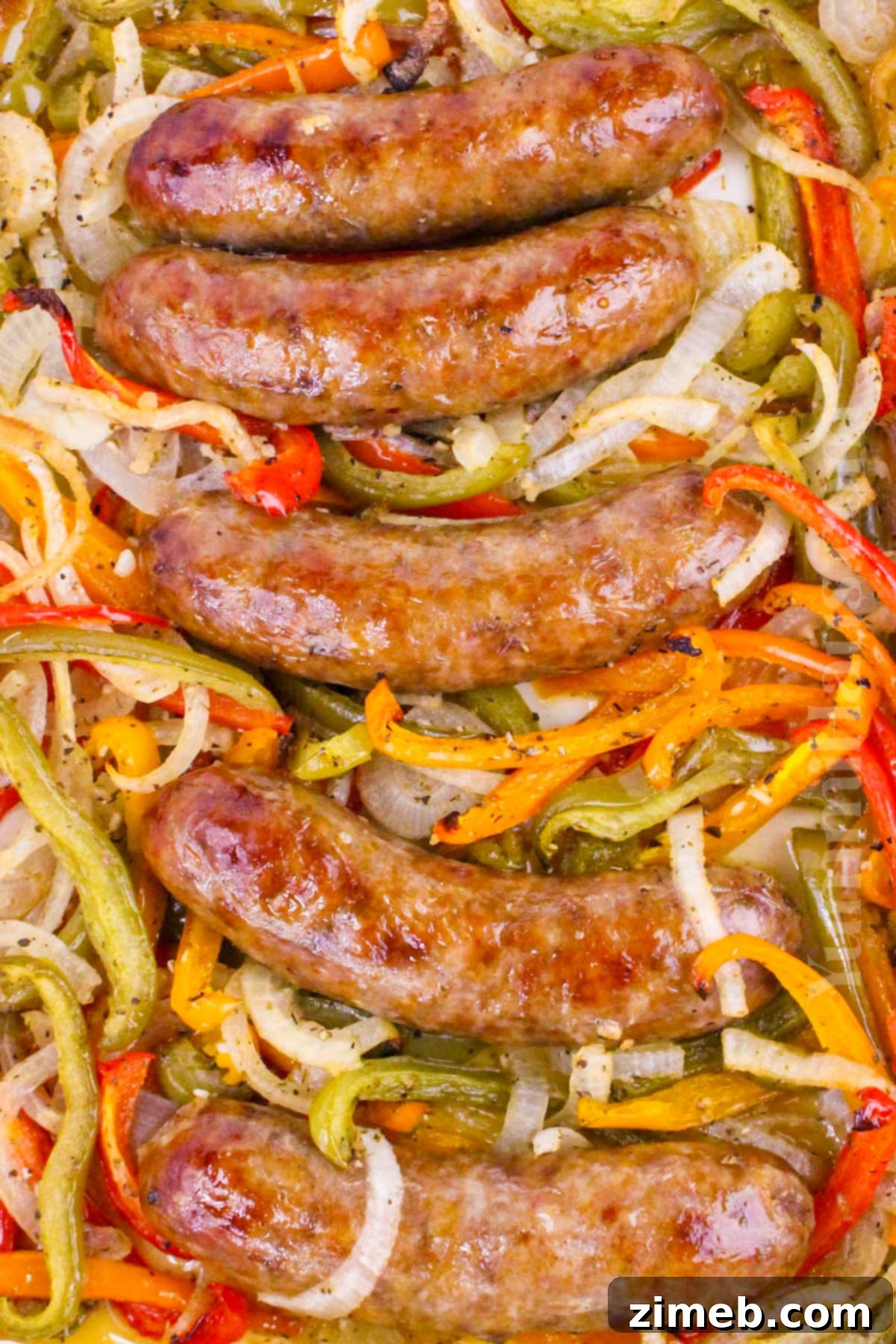 Quick and easy baked dinner featuring perfectly seasoned Italian sausage and colorful bell peppers.