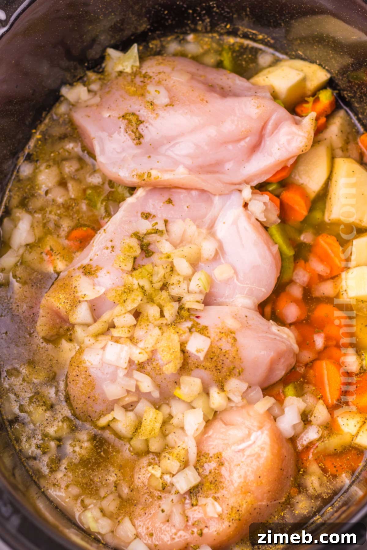 Comforting Slow Cooker Chicken Stew 5 making chicken in the crockpot