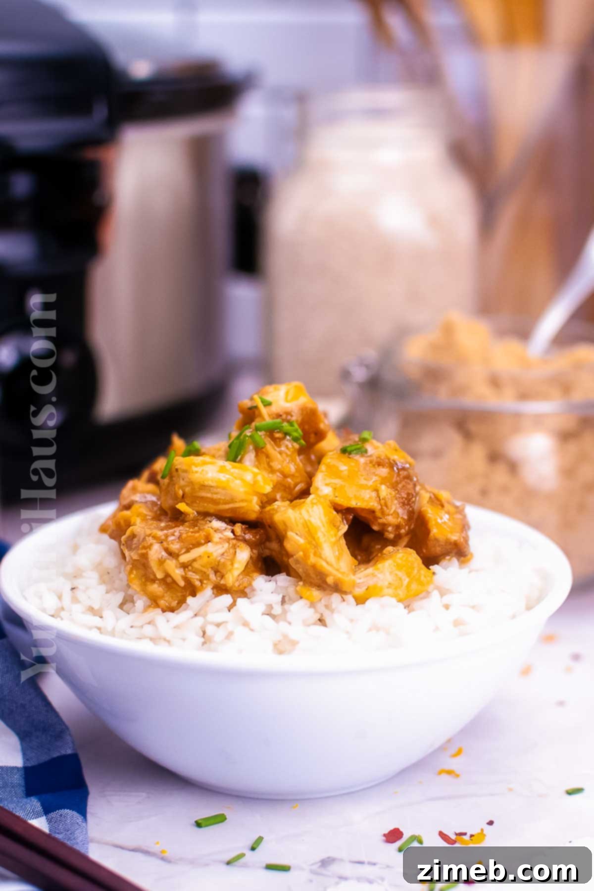 Zesty Orange Slow Cooker Chicken 3 crockpot Chinese dinner with tender chicken and sticky orange sauce