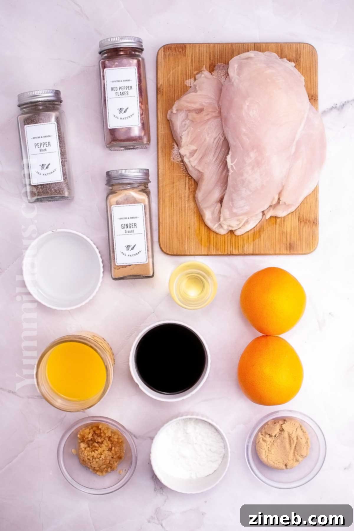 Zesty Orange Slow Cooker Chicken 4 Slow Cooker Orange Chicken ingredients laid out for cooking