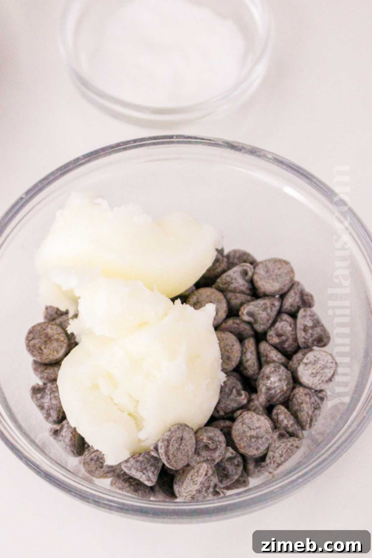 Melting sugar-free chocolate chips for keto coconut clusters