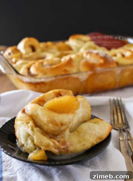 Flaky Apple Pie Cinnamon Rolls with a sweet glaze, a perfect comforting breakfast.