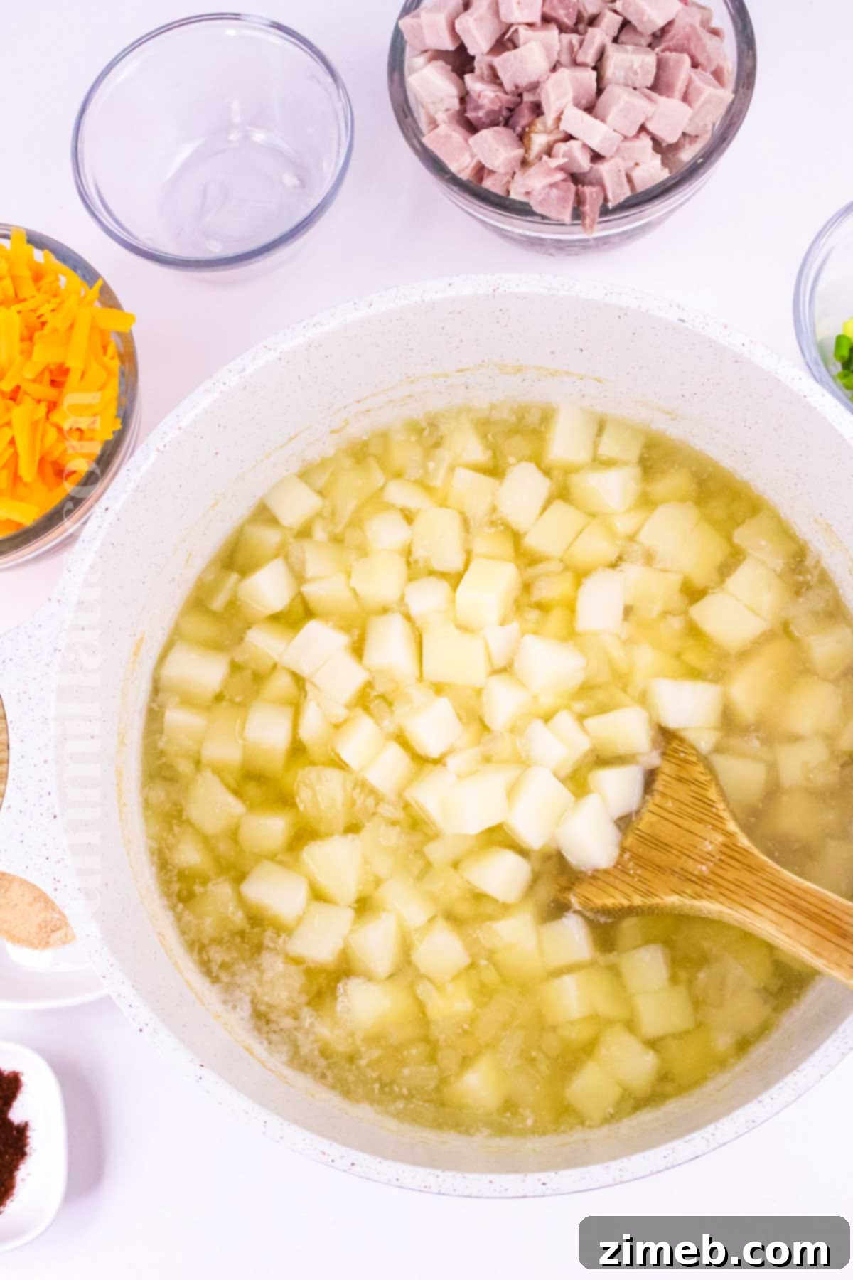 Hearty Ham and Potato Cheese Chowder 5 cooking the potatoes for soup