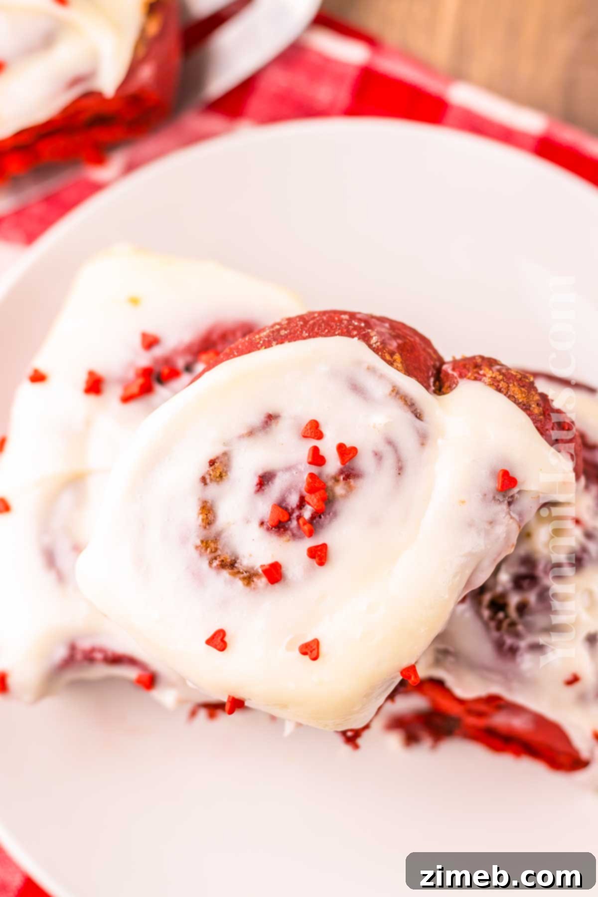 Cream Cheese Frosting on Red Velvet Cinnamon Rolls