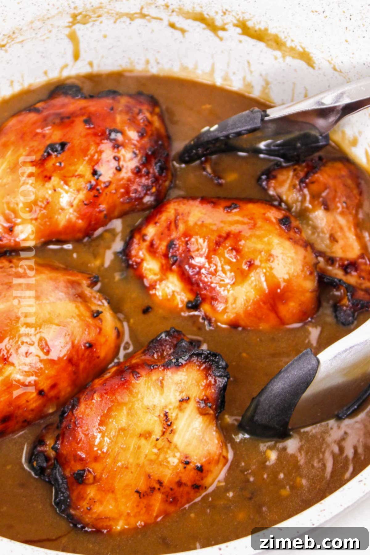 Crispy Air Fryer Teriyaki Chicken Thighs 8 coating in the sauce