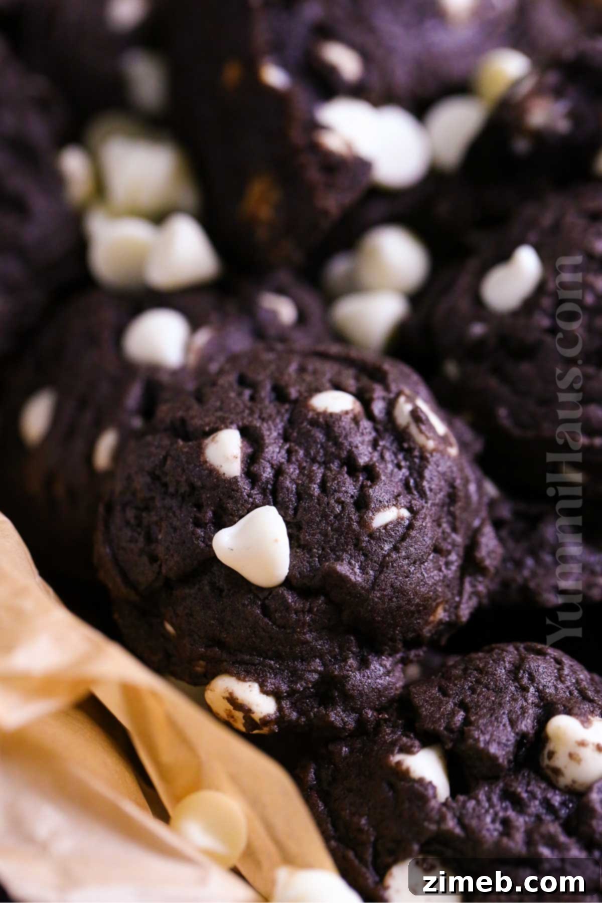 Double Chocolate White Chocolate Cookies 14 A stack of fudgy white chocolate chocolate cookies.