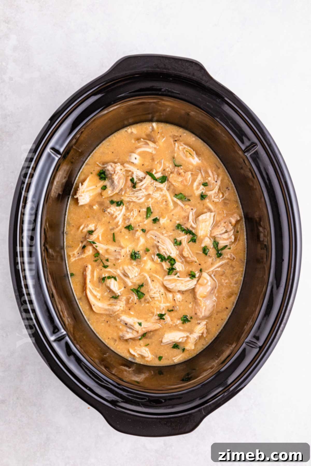 Cozy Comfort Crockpot Chicken and Gravy 7 Crockpot Chicken and Gravy being served