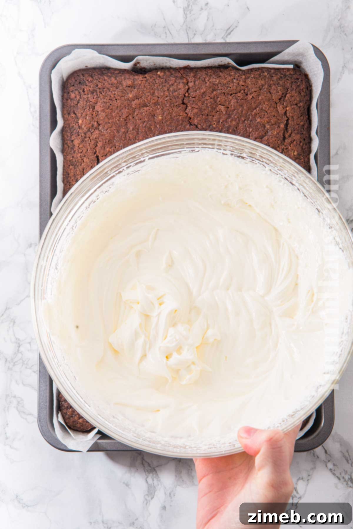 Rich Guinness Chocolate Stout Cake 8 Swirls of fluffy cream cheese frosting on top of the finished Guinness Cake, ready to be served.